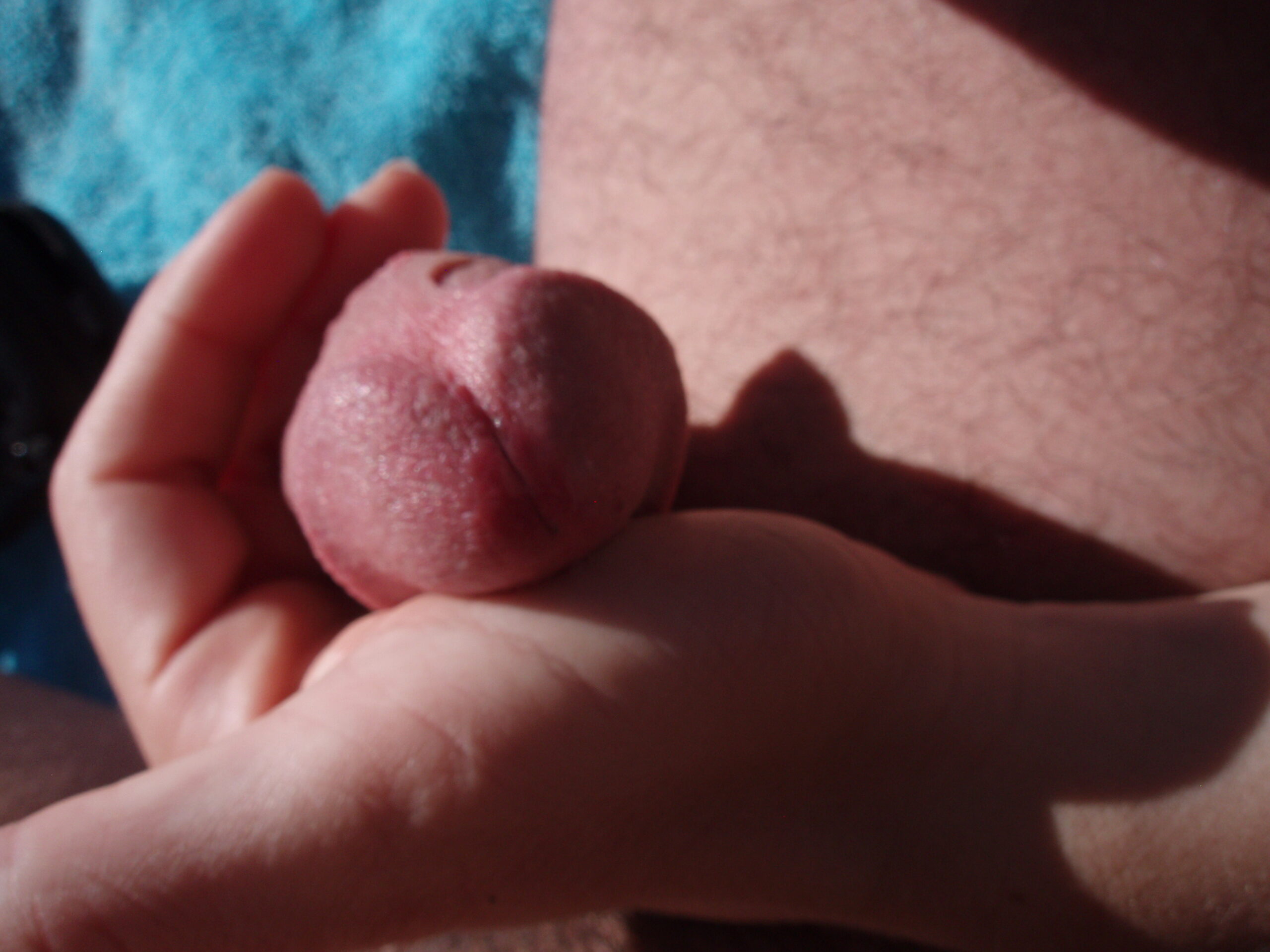 Giving a hanjob on a public nude beach